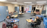 South Washington County Schools teachers smile for the camera.