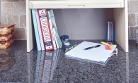 A designated study space set up on a countertop after fall cleaning. 