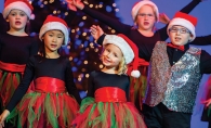 Children sing and dance during Aspire Music Academy's Holiday Spectacular.