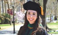 Jessica Ulrich wears a cap and gown and graduation day.