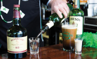 A bartender at O'Malley's Irish Pub, a finalist for best tavern/bar/brewery in the Best of Woodbury 2019 readers' choice survey, pours a shot of Jameson Irish whiskey. A freshly-poured Guiness sits nearby.