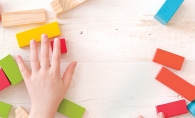 A child plays with blocks