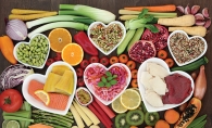 A spread of heart healthy foods, arranged in hearts.