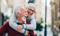 A pair of super agers laughing.