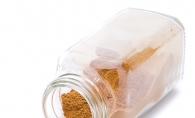 Spices A spilled bottle of cinnamon.
