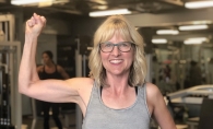 Rhonda Habel flexes at UpLift Guided Fitness in Woodbury