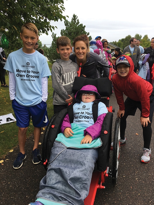 Drew Gavin, Kaden and Amber Baron, Gaborik Greenebaum, Madeline Hartung  at the Family Achievement Center Move to Your Own Groove