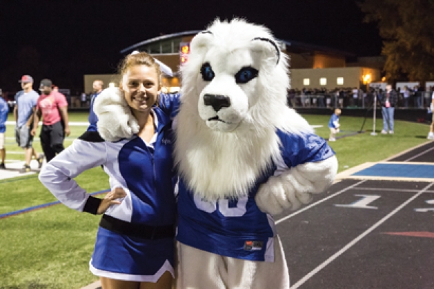 Kylie Johnson and Roar, the mascot