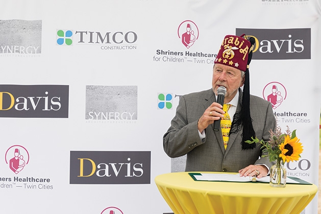 A man speaks at the Shriners Healthcare for Children groundbreaking in Woodbury.