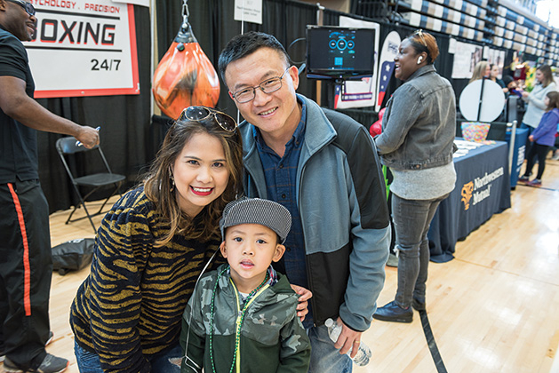 Juvy, Simon and Yubo Huang at the Woodbury Area Chamber of Commerce Community Expo.