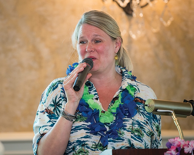 Laurie Staiger speaks at the 33rd annual Woodbury Area Chamber of Commerce golf tournament.