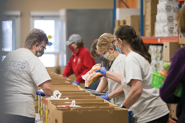 Christian Cupboard Emergency Food Shelf volunteers serving the community during the COVID-19 pandemic.