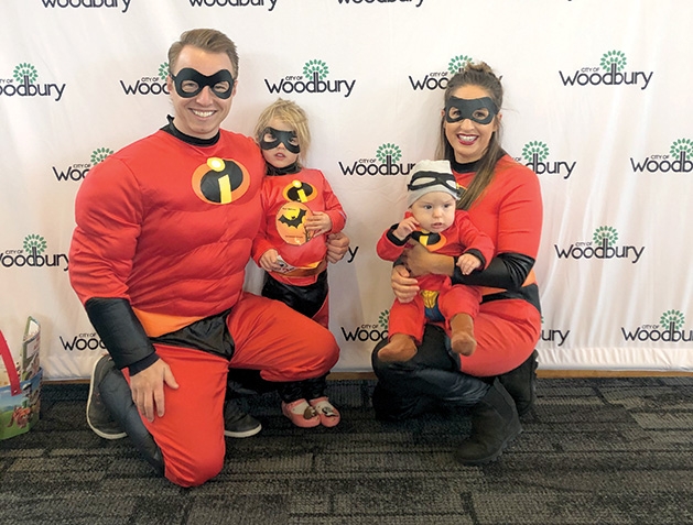 A family in costume as the Incredibles at Woodbury's Halloween Hoopla event.