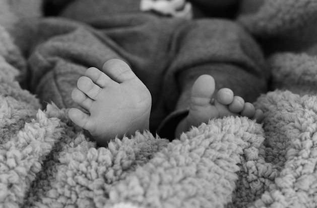 The feet of a baby born at Woodwinds Hospital in Woodbury