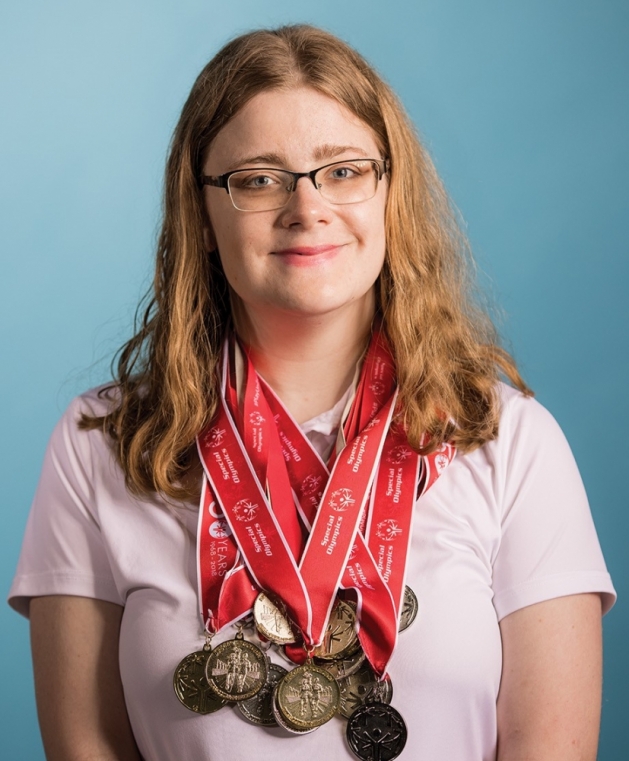 Sydney Sexton with her gold metals.