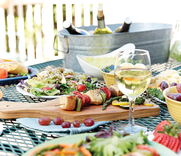 A table filled with food from TST Creative Catering, a catering service in the Twin Cities area.