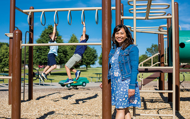 Emily Bowman, publisher of Macaroni Kids SE Metro, MN, plays with her kids at Colby Lake Park