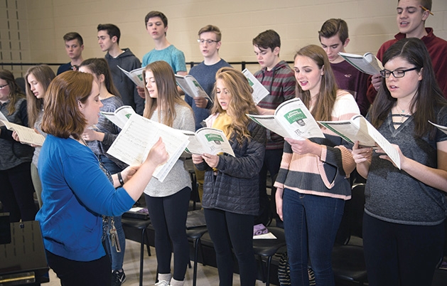 The East Ridge High School choir practices