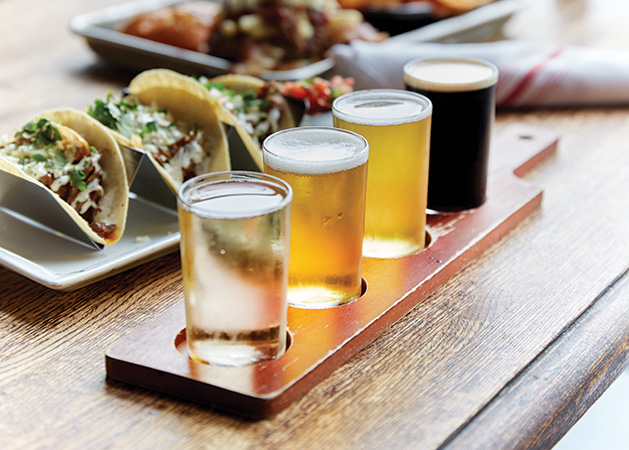 A Tamarack Tap Room flight of beers on the restaurant's patio.