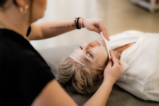 woman getting a facial woman getting a facial
