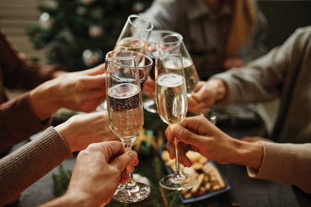 Cheers with wine glasses.