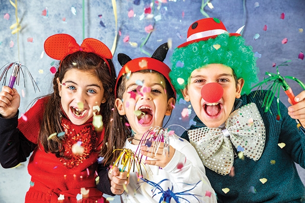 Kids celebrate at the Woodbury rec department's New Year's Eve Family Celebration at HealthEast Sports Center