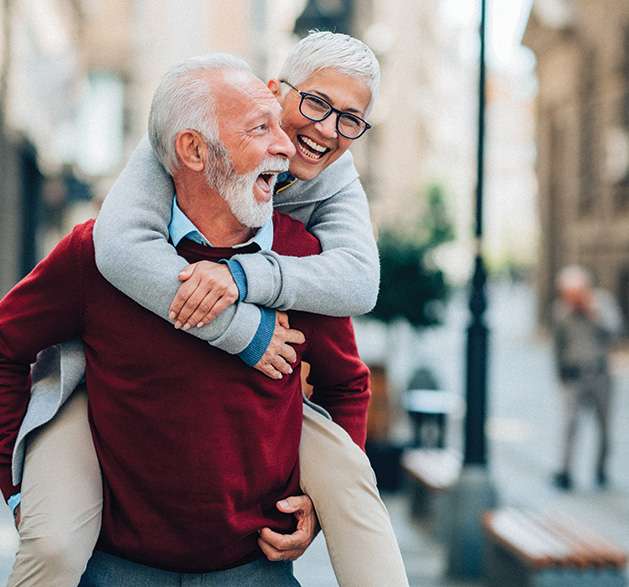 A pair of super agers laughing.