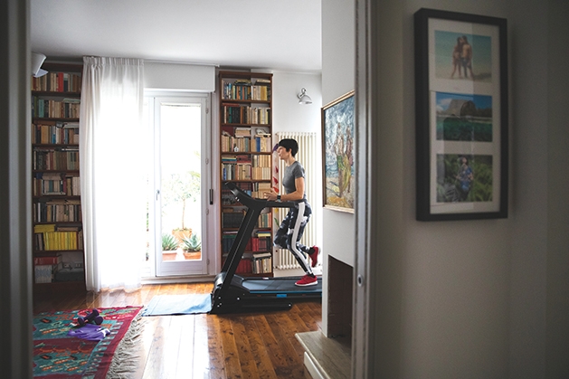 Running on a treadmill at home.