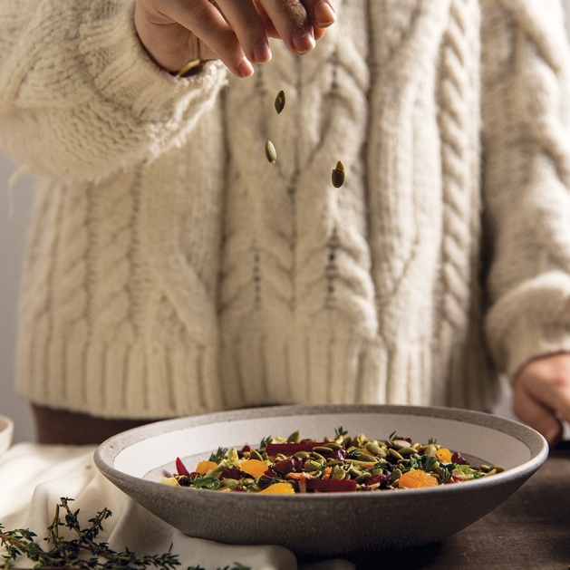 Garnishing a side dish.