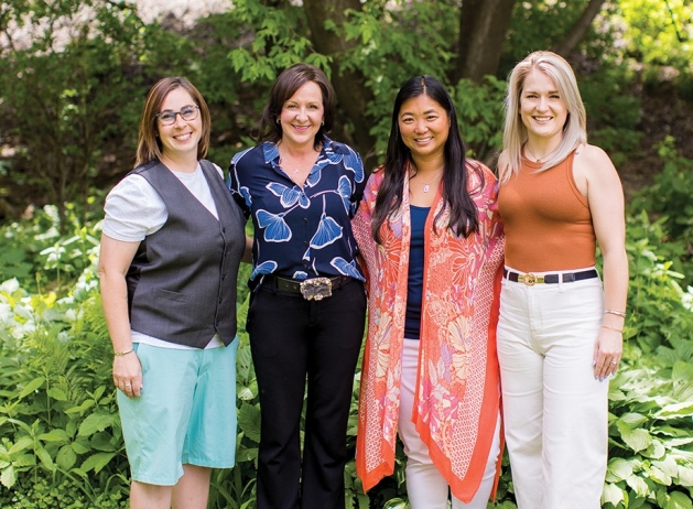 The four SoWashCo teachers nominated for the Minnesota Teacher of the Year award posing together.