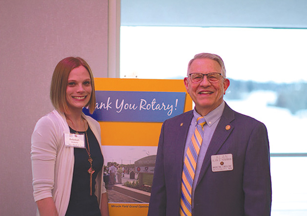 Rebekah Windschitl and Al Henaman at the Rotary Club of Woodbury's Share Your Love Gala.