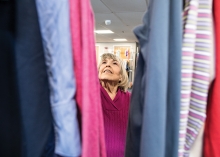 A woman browses the clothing at Woodbury Lutheran Church's Christian Closet.