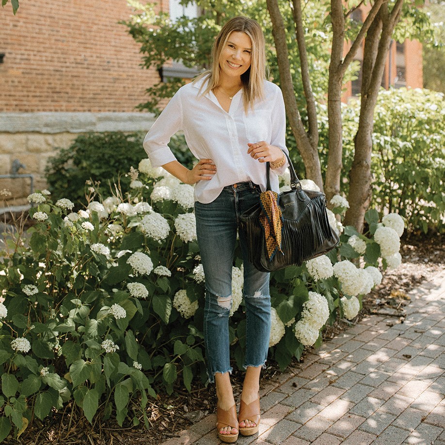 Stylist Alexandra Eve posing outside.