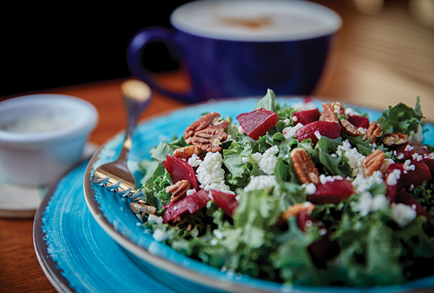 A salad and cup of coffee from Lake Elmo Coffee