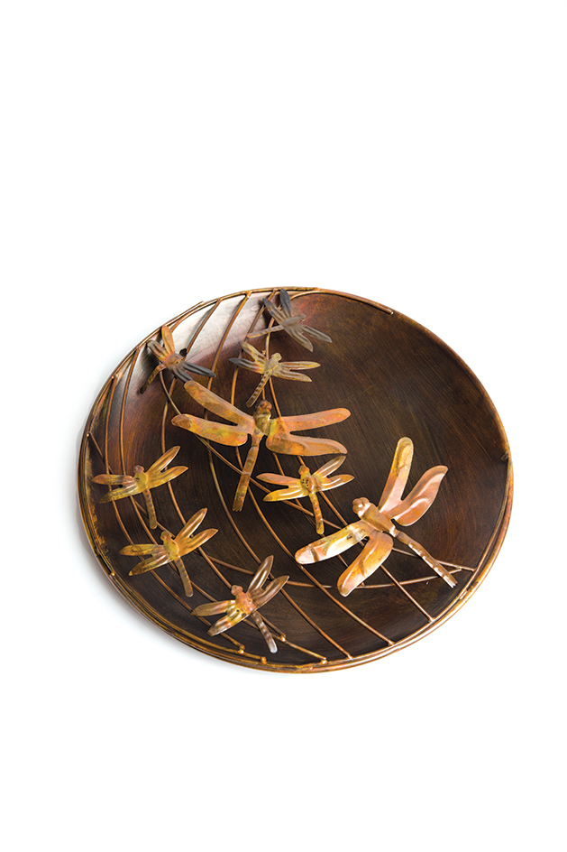 A wall disc featuring dragonflies from The Woods