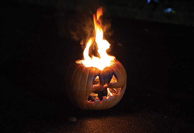 The flaming pumpkin, one of the signature pieces of John Soma's Halloween yard display in Woodbury.