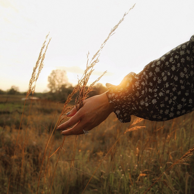 Rana Monet walks through a field