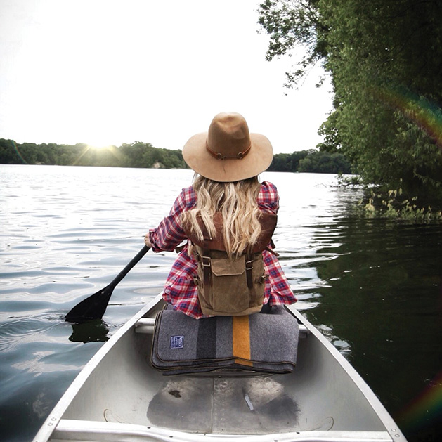 Rana Monet on a canoe.